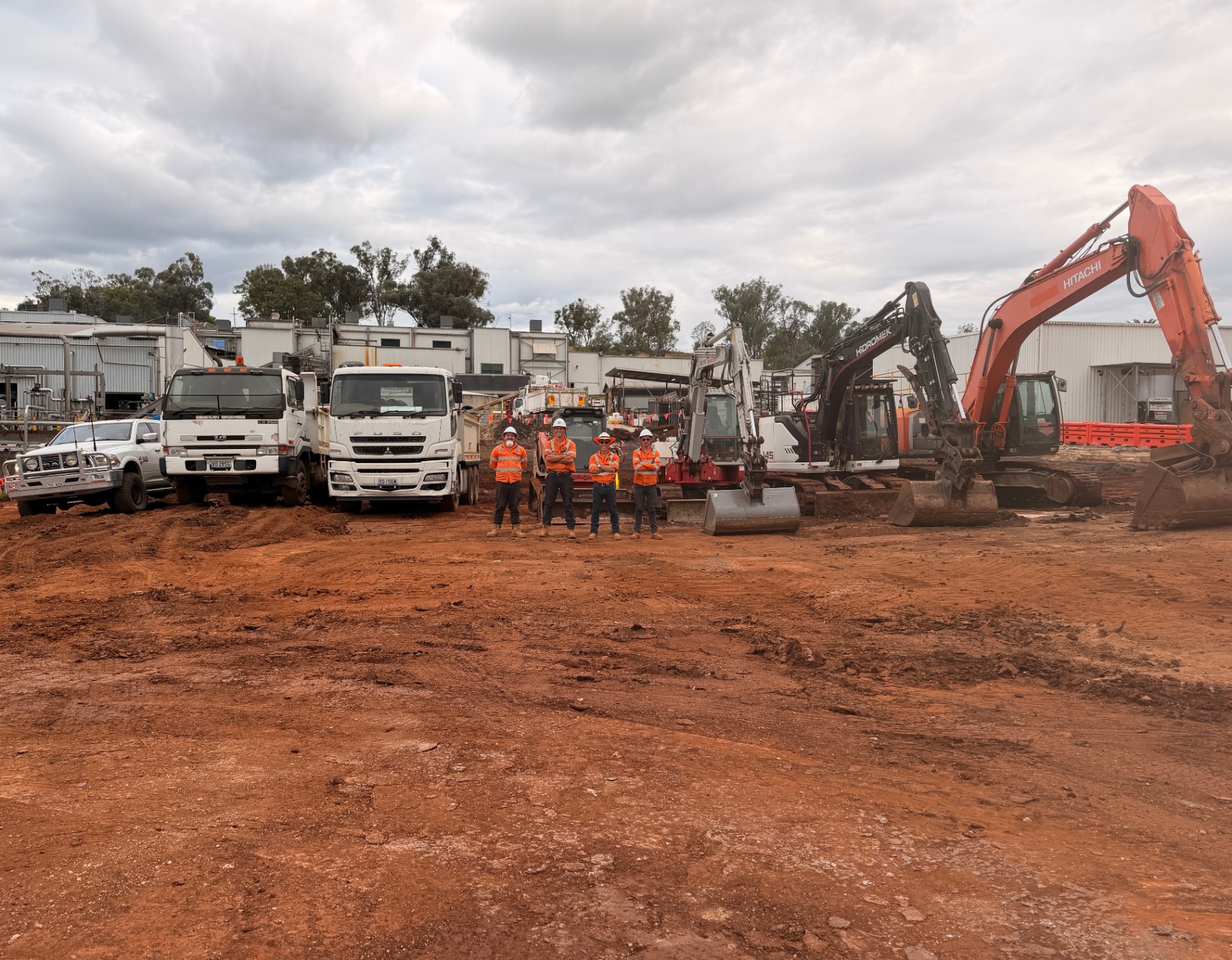 Engineers reviewing plans on site